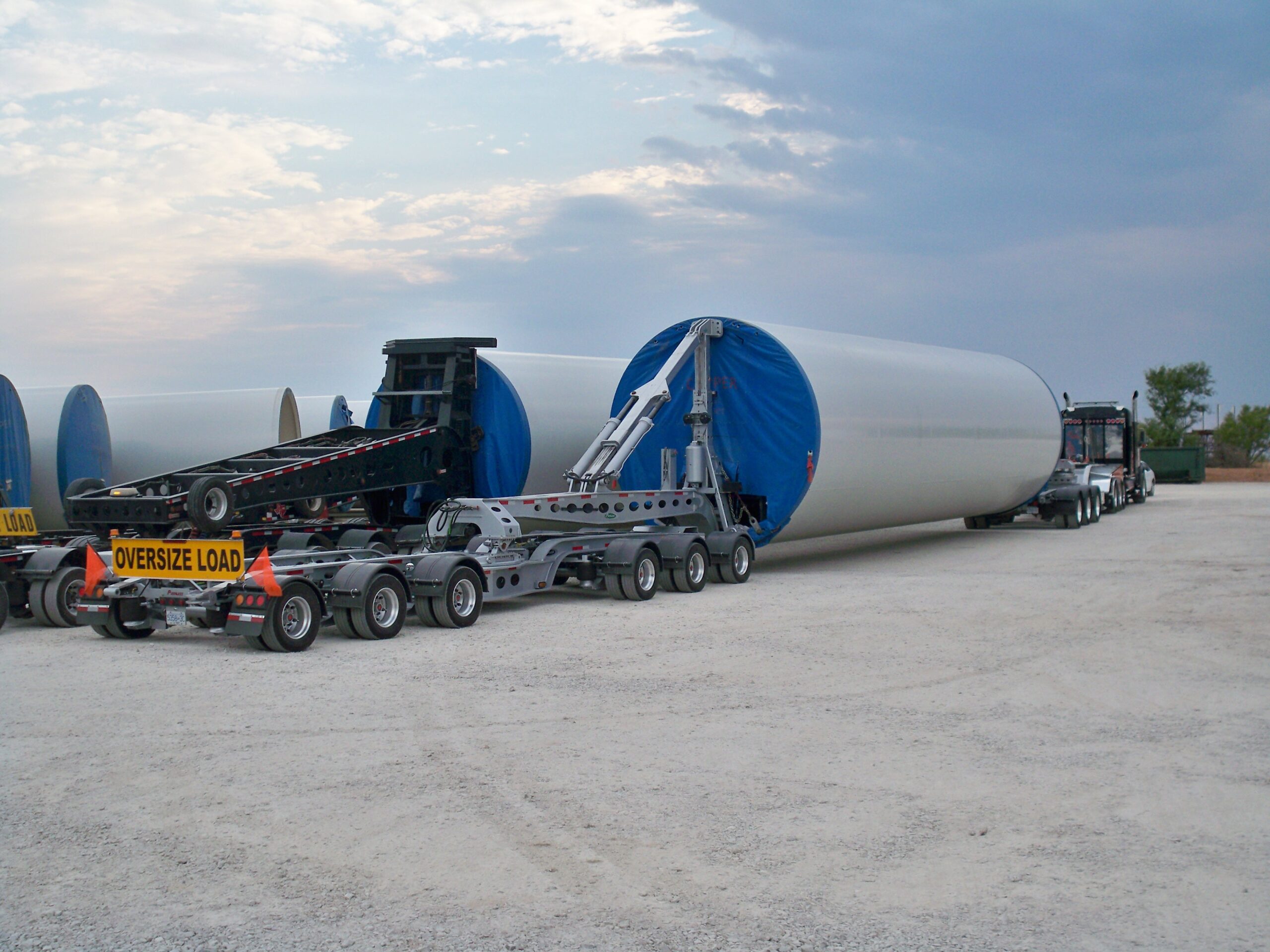 Dual schnabel component trailers loaded with wind tower sections